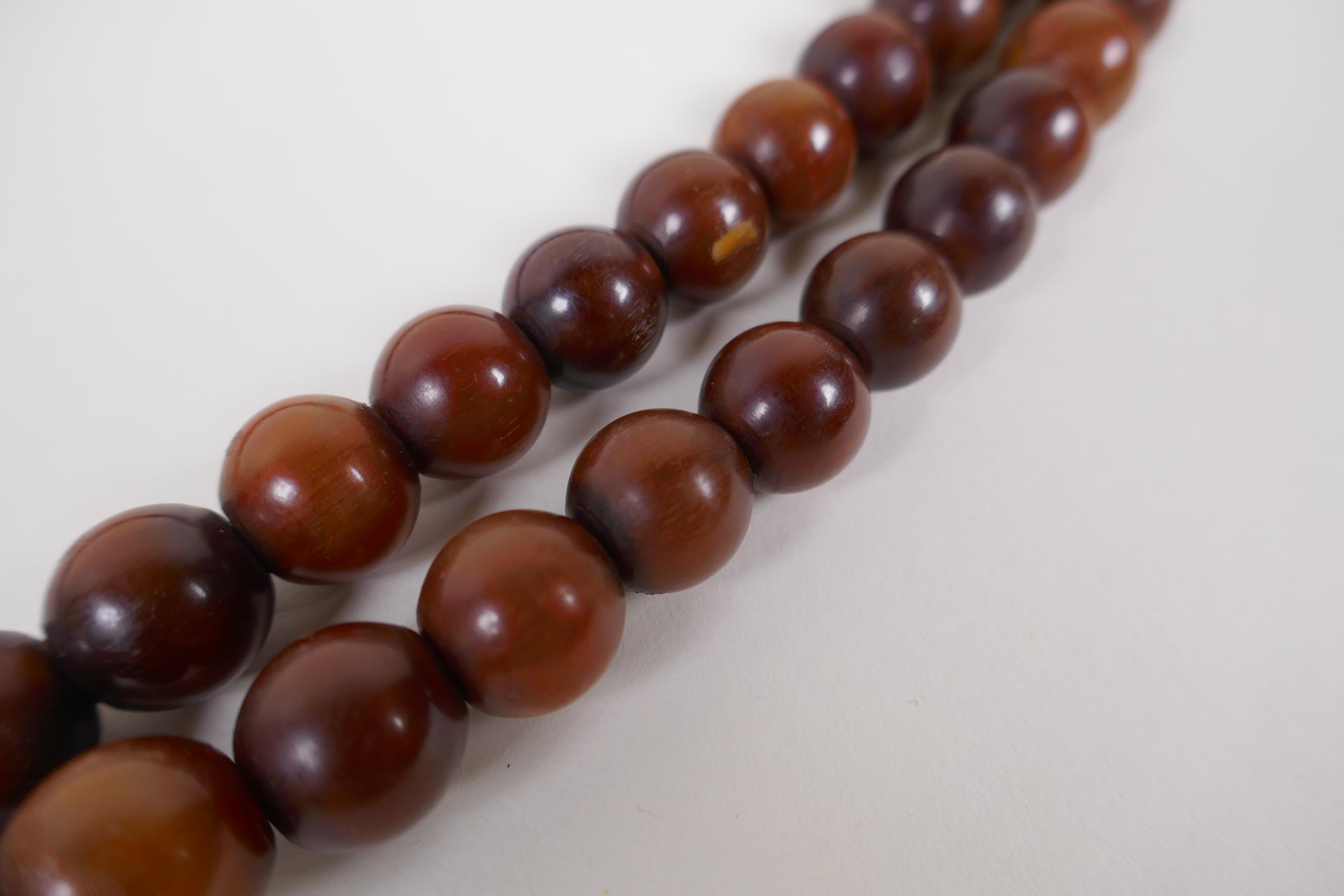 A string of horn prayer beads, 150cm long - Image 3 of 3