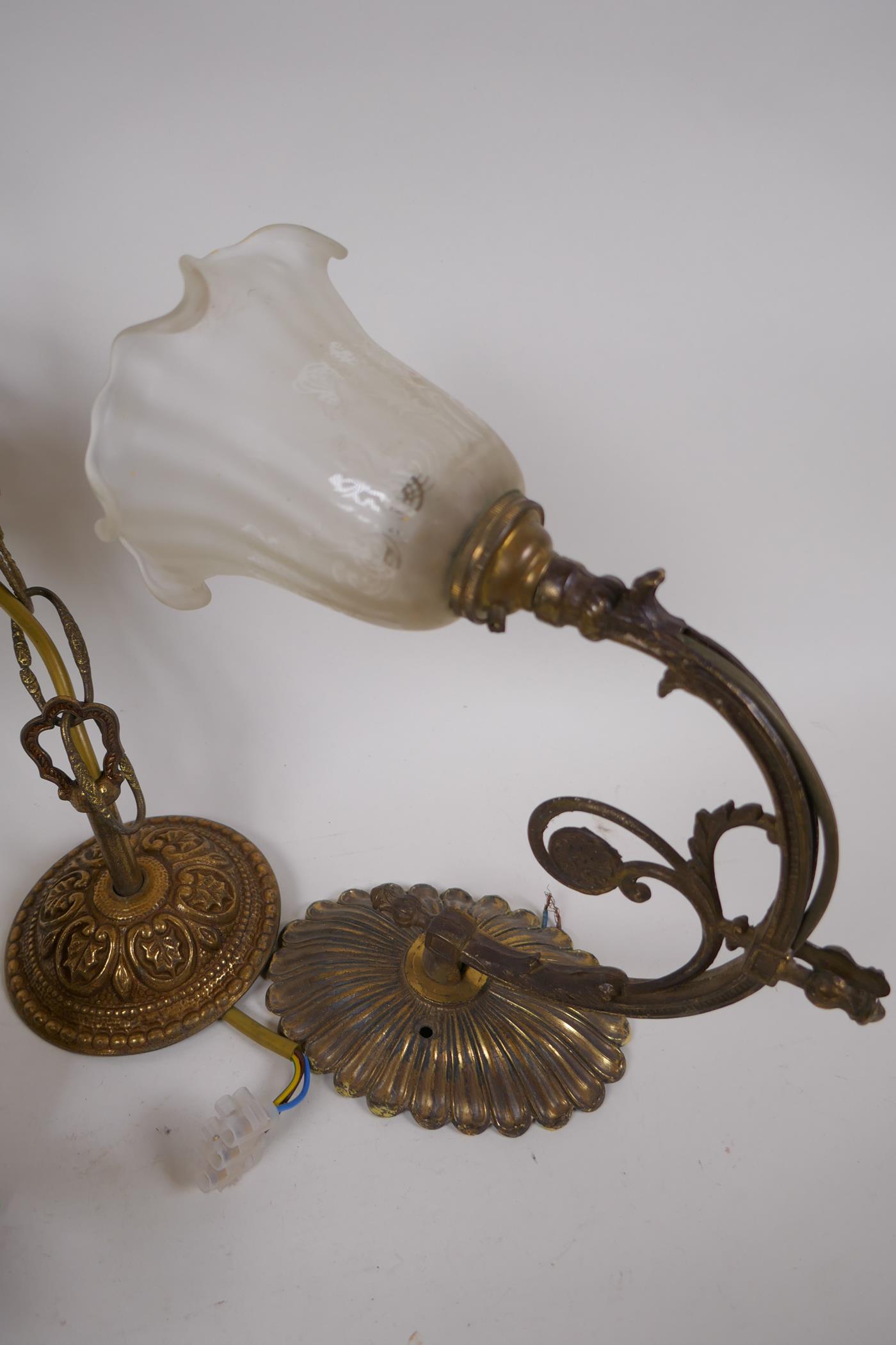 A cylindrical brass hall lantern, 38cm long, AF glass missing, and a cast brass wall sconce with - Image 2 of 3