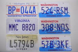 Six USA state numberplates, 31cm x 16cm