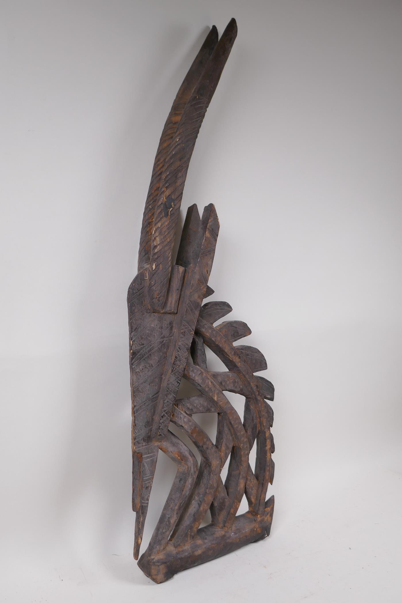 An African carved wood antelope bust, 71cm high - Image 3 of 3