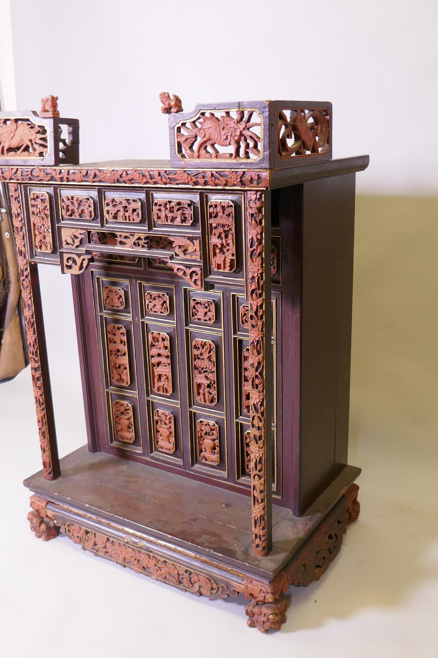 A Meiji lacquered and giltwood shrine with two doors opening to reveal a stepped interior, raised on - Image 4 of 5