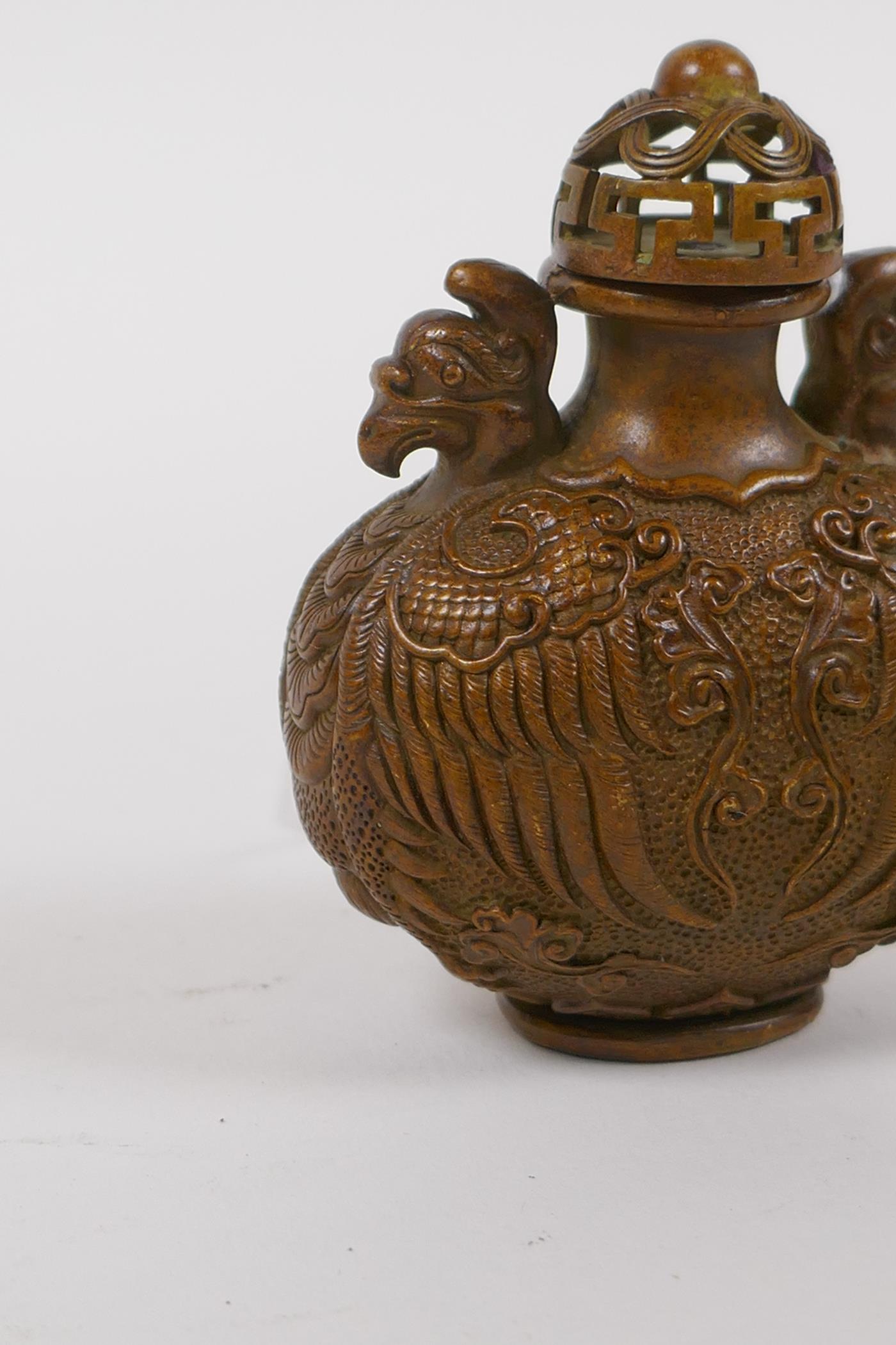 A Chinese bronze snuff bottle with phoenix decoration, impressed 6 character mark to base, 7cm high - Image 2 of 4