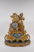 A C19th French gilt spelter mantel clock with Sevres style porcelain panel and dial, 37cm wide x
