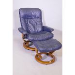 A blue leather Ekornes Stressless armchair and footstool
