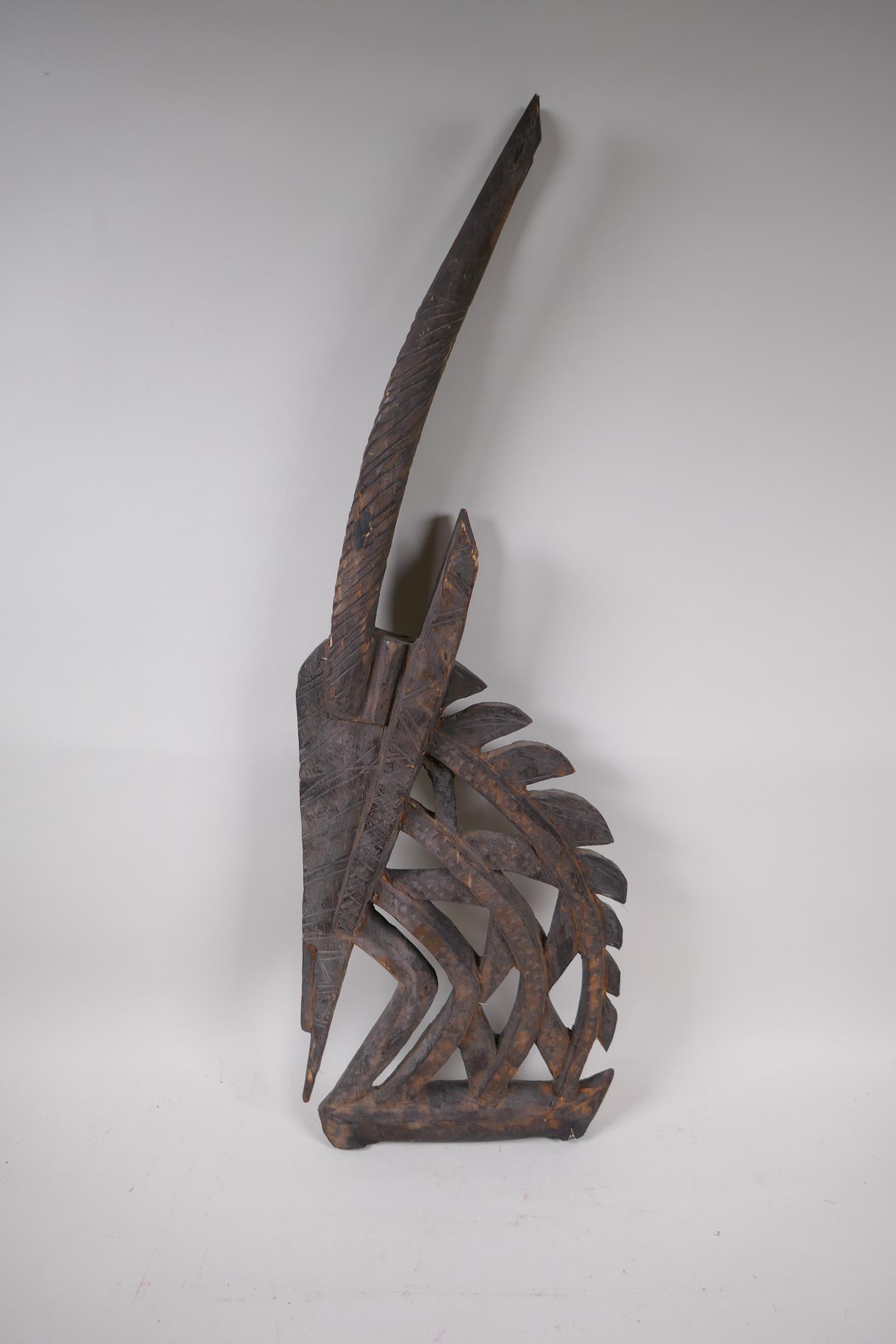 An African carved wood antelope bust, 71cm high - Image 2 of 3