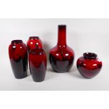 Five Royal Doulton flambe glazed ceramic vases, one restored, largest 35cm high, AF hairline crack