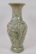 An oriental celadon glazed porcelain vase, embossed with dragons (drilled), 30cm