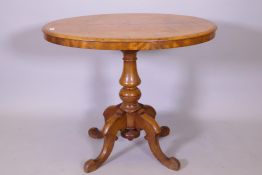 A Victorian satinwood tilt top breakfast table, 92cm x 68cm, 76cm high