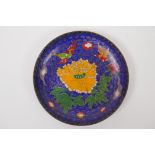 A Chinese cloisonne dish with bird and flower decoration, engraved bat and auspicious symbol