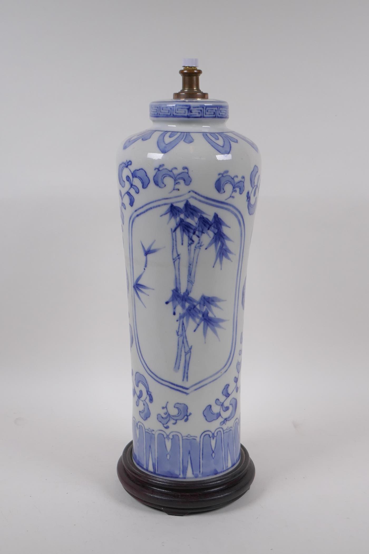 A Japanese 'Tarogo' blue and white porcelain lamp with bamboo decoration, 44cm high
