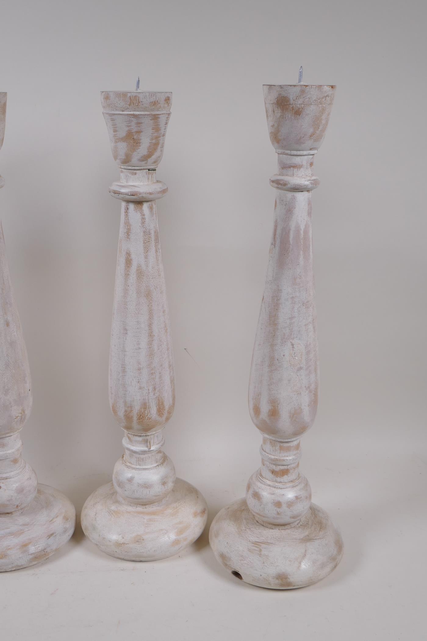 Two pairs of painted and distressed pricket candlesticks, 46cm high - Image 3 of 3