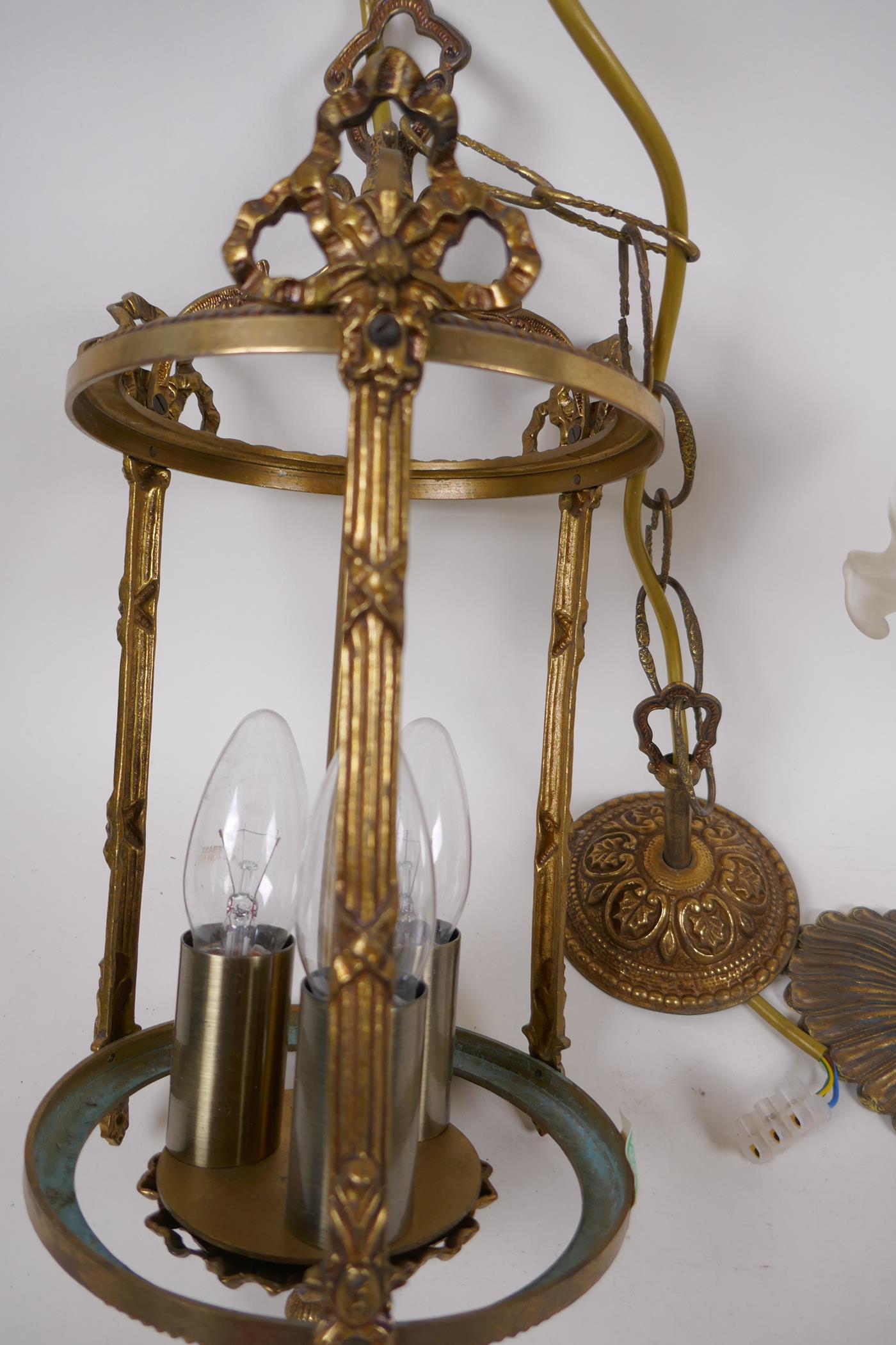 A cylindrical brass hall lantern, 38cm long, AF glass missing, and a cast brass wall sconce with - Image 3 of 3