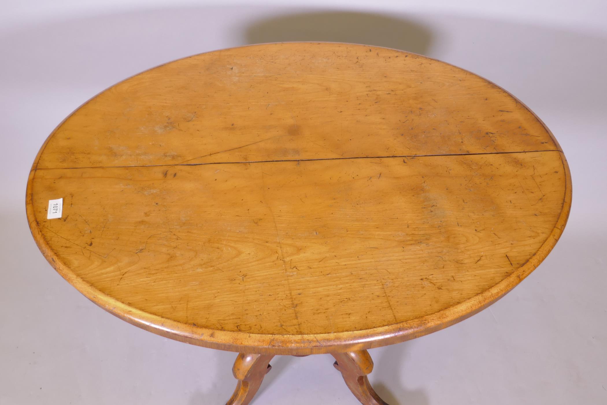 A Victorian satinwood tilt top breakfast table, 92cm x 68cm, 76cm high - Image 2 of 3