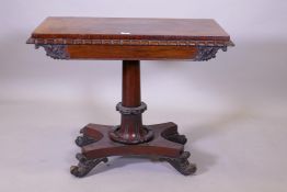 A William IV card table, with moulded edge top, raised on a tapering column and platform base with