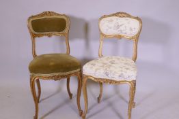A pair of late C19th/early C20th French carved giltwood side chairs, raised on cabriole supports