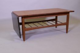 A 1960s E. Gomme G-Plan teak and ebonised drop leaf coffee table, model 8029, designed by Richard