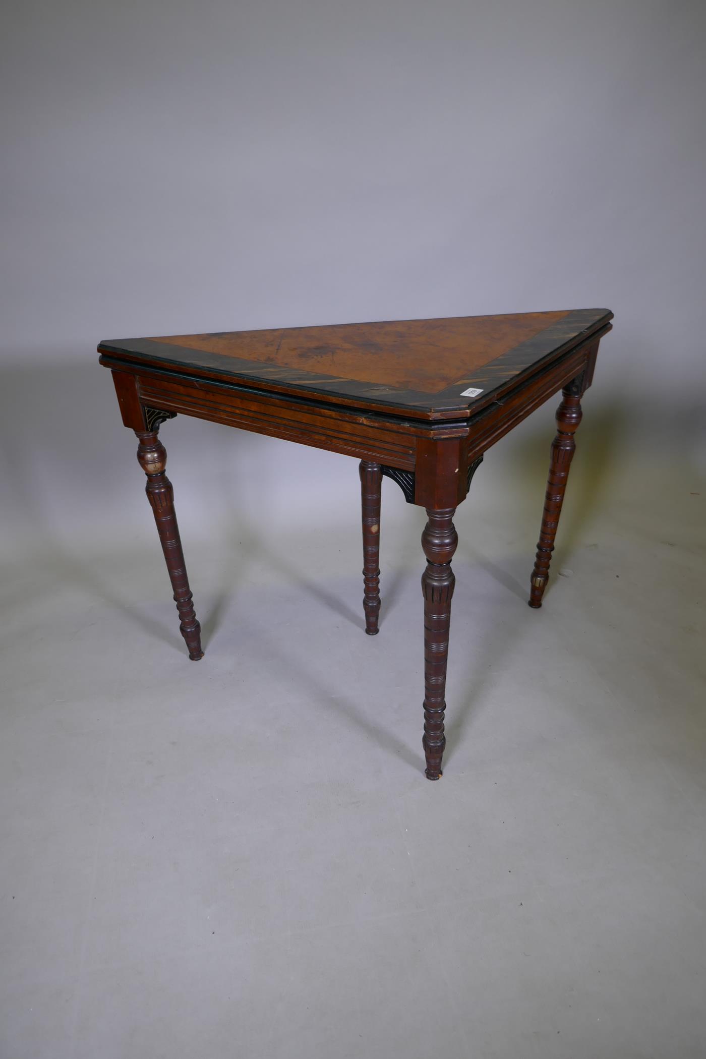 An Arts & Crafts satinwood and coromandel games table with fold over top and turned supports, 75 x - Image 2 of 7