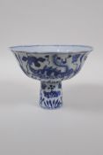 A blue and white porcelain stem bowl with lobed rim and carp decoration, Chinese Xuande 6