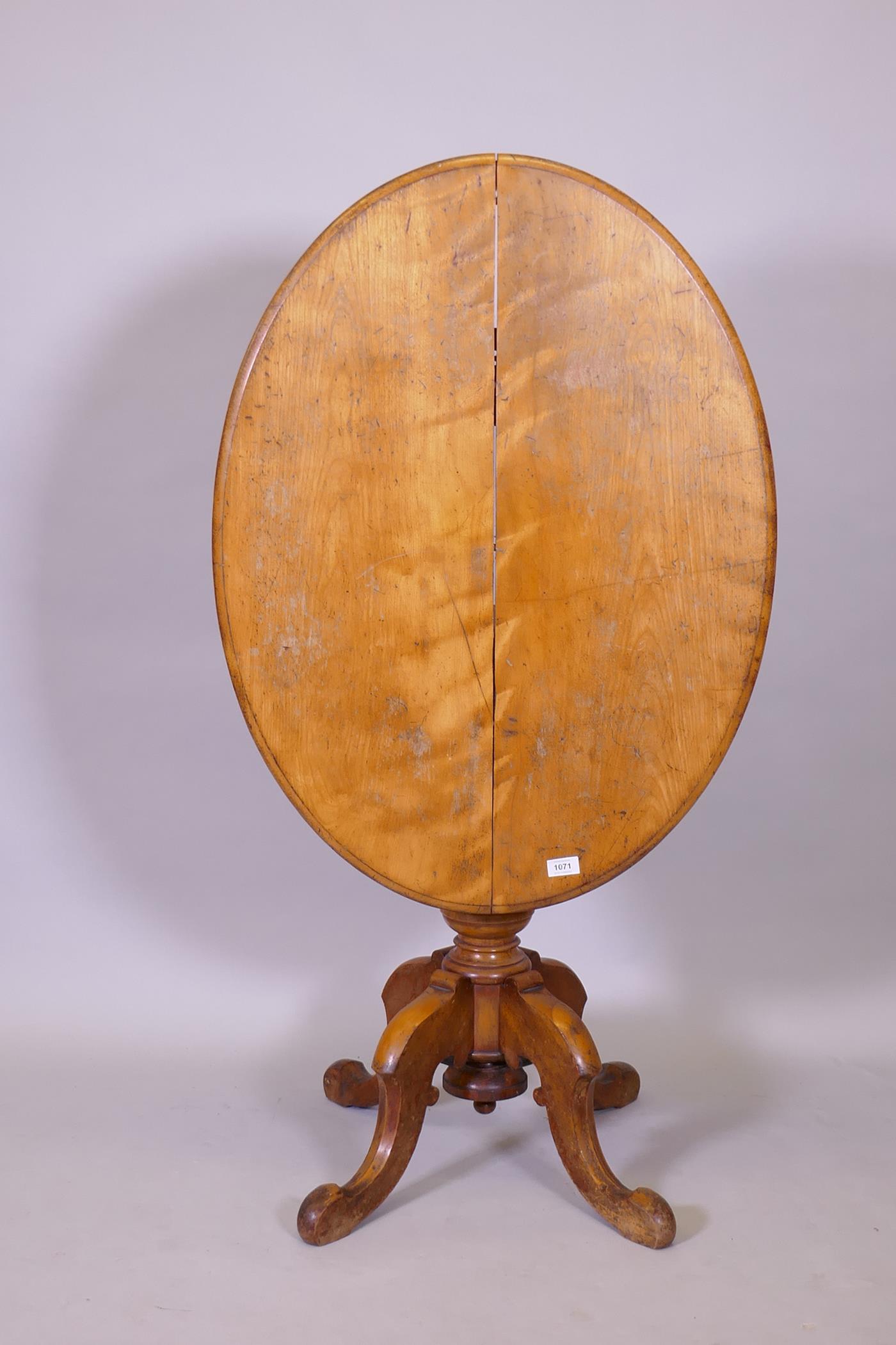 A Victorian satinwood tilt top breakfast table, 92cm x 68cm, 76cm high - Image 3 of 3