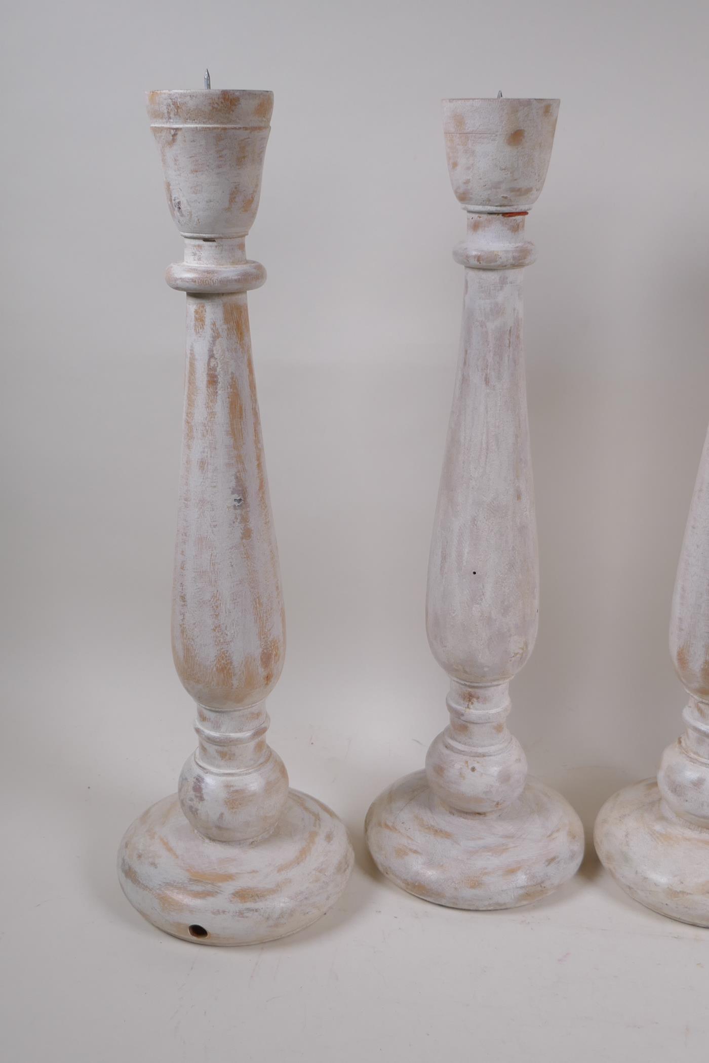 Two pairs of painted and distressed pricket candlesticks, 46cm high - Image 2 of 3