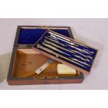 A Victorian rosewood cased set of compasses and draughtsman's instruments, 21cm x 12cm x 14cm