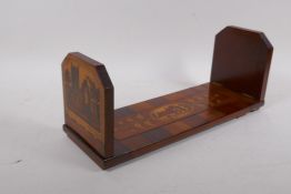 A Killarney inlaid extending book slide, decorated with images of Muckross Abbey, Ross Castle and