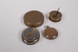 Four assorted reproduction brass compasses, largest 8cm diameter