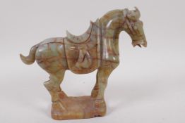 A Chinese carved hardstone figure of a horse, 18cm high