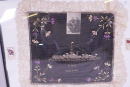 An embroidered silk with lace border and photograph of crew mates of HMS Ironduke, early C20th