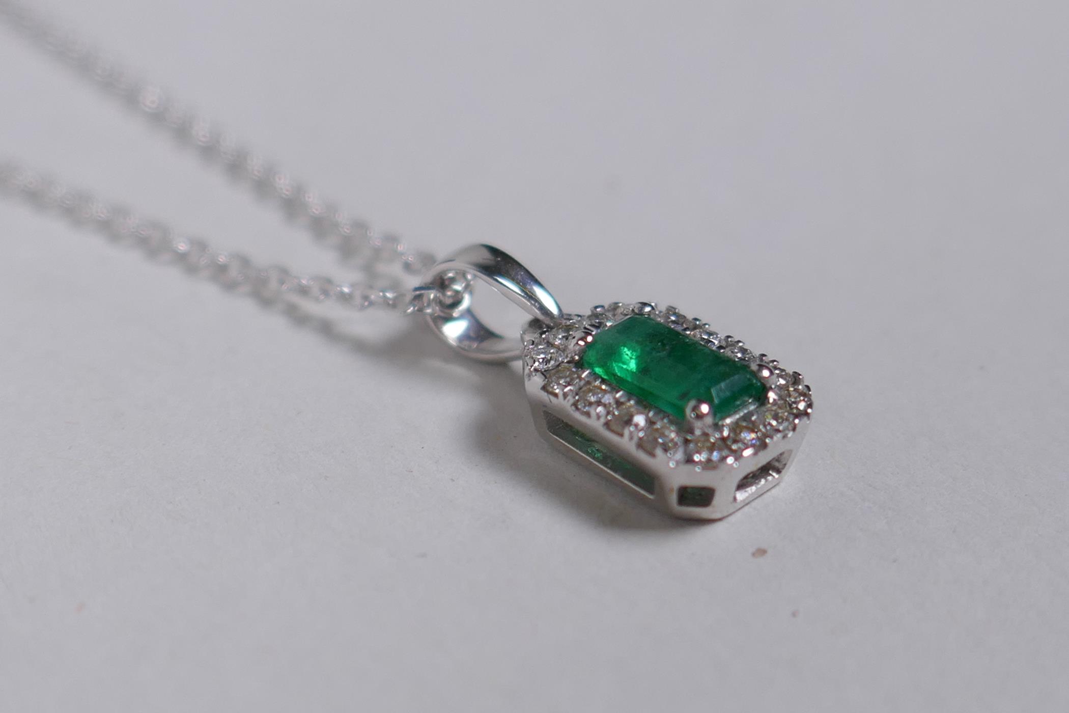An 18ct white gold, emerald and diamond set pendant necklace, approx 40 points - Image 2 of 3