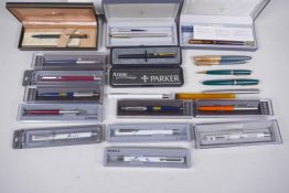 A collection of pens, Parker Laque, Duofold with 14ct gold nib, gold plated fountain pen and