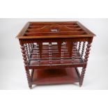 A mahogany magazine canterbury with bobbin turned columns, 44 x 36 x 45cm