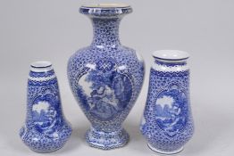 A set of three Popplesdorf porcelain vases decorated with figures on a mottled ground, largest