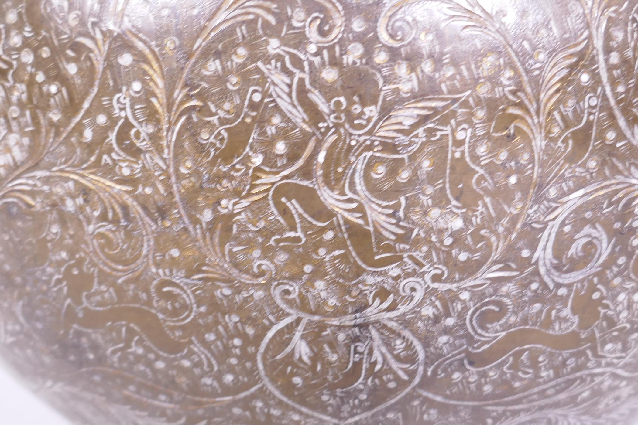 An antique Indian brass vase with engraved decoration of scrolling foliate designs and figures - Image 3 of 7