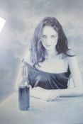 Bob Carlos Clarke, photograph of a woman with open wine bottle, signed 40 x 50cm overall