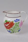 A late C18th/earlyC19th creamware milk jug painted with flowers, 12cm high