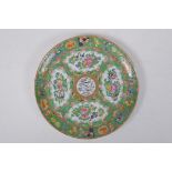 An antique Canton famille rose enamelled porcelain cabinet plate for the Persian market, dated