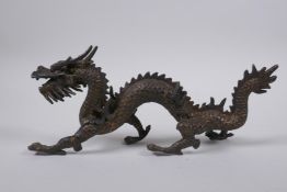 A Chinese gilt bronze dragon, 26cm long