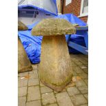 Antique saddle stone, 79cm high