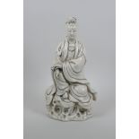 A Chinese blanc de chine figure of Quan Yin, impressed marks verso, 31cm high