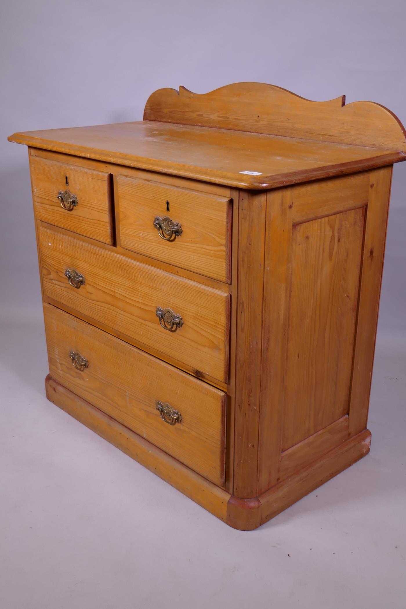 An Edwardian pine chest of two over two drawers, raised on a plinth base, 93 x 49 x 90cm - Image 3 of 3