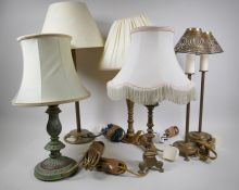 A pair of brass table lamps and four others, largest 60cm high