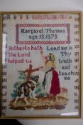 A needlework sampler by Margaret Thomas aged 13, dated 1873, 31 x 41cm