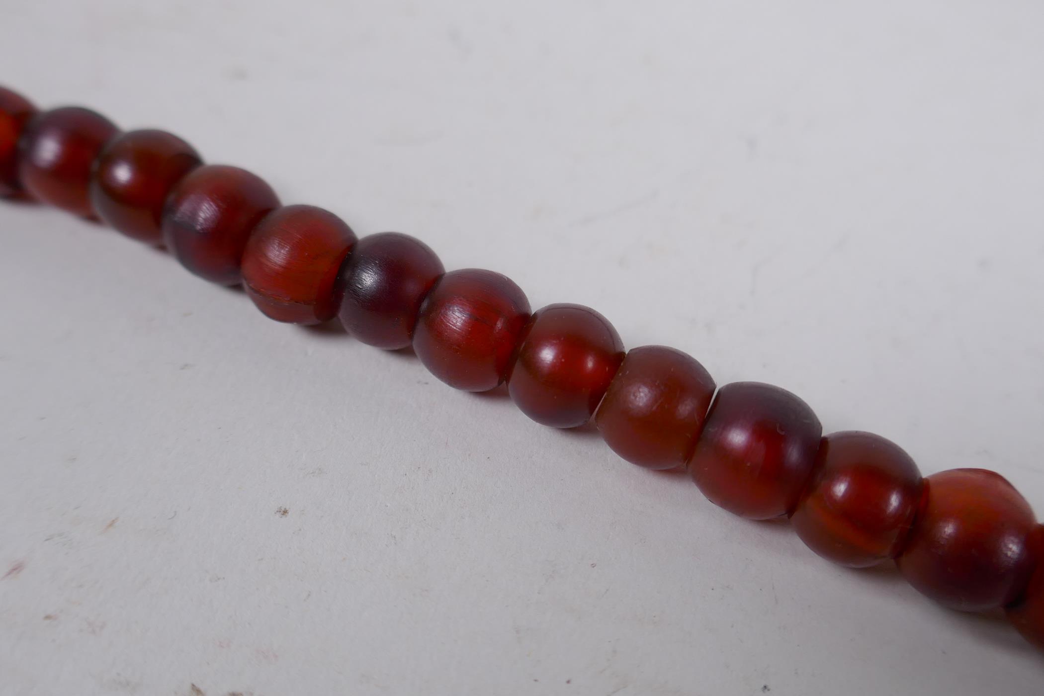 A string of horn mala beads, 90cm long - Image 3 of 4