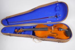 A Stainer violin with two piece back, stamped Stainer and patent No 23140, with bow in fitted hard