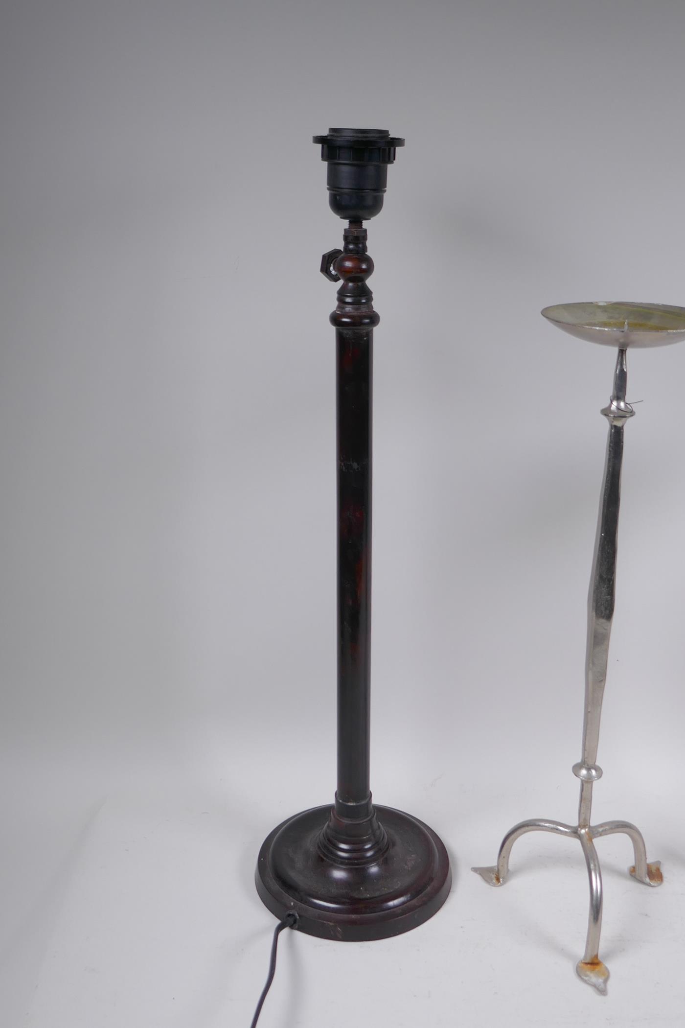 A plated pricket candle stick and another, smaller, together with two bronze table lamps, largest - Image 3 of 4