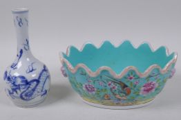 A Chinese porcelain Monteith wine glass cooler, painted with birds and flowers in bright enamels,