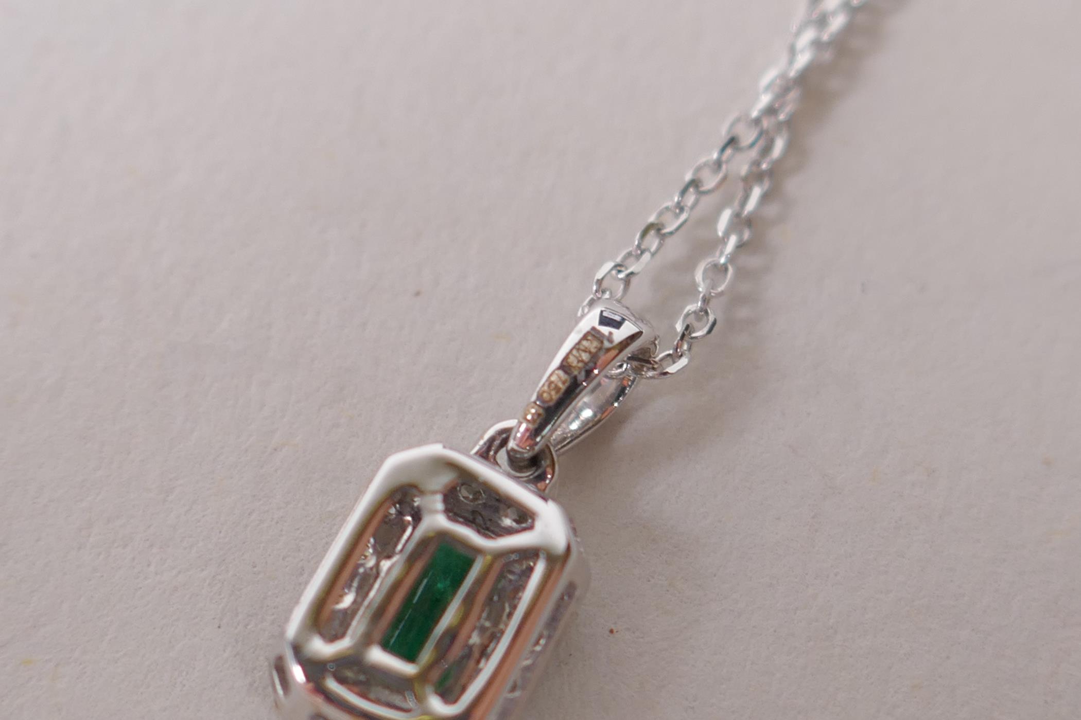 An 18ct white gold, emerald and diamond set pendant necklace, approx 40 points - Image 3 of 3