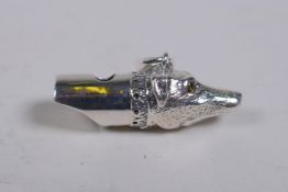 A 925 silver dog's head whistle, 4cm