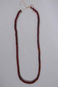 A string of horn mala beads, 90cm long